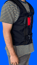 Load image into Gallery viewer, Side view of GLH Systems Emergency Procedures Training Jacket worn over casual clothing

